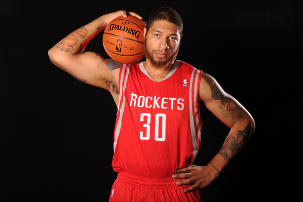 Royce White celebrated the Rockets' win on Wednesday. (Brian Babineau/Getty Images)